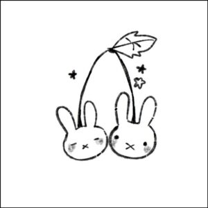 a small doll with a clock on it