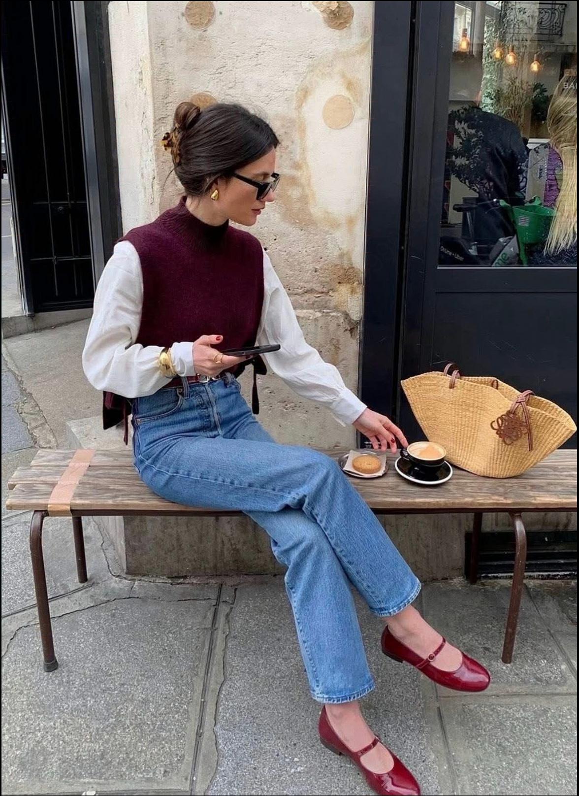 a man sitting on a bench with a piece of paper