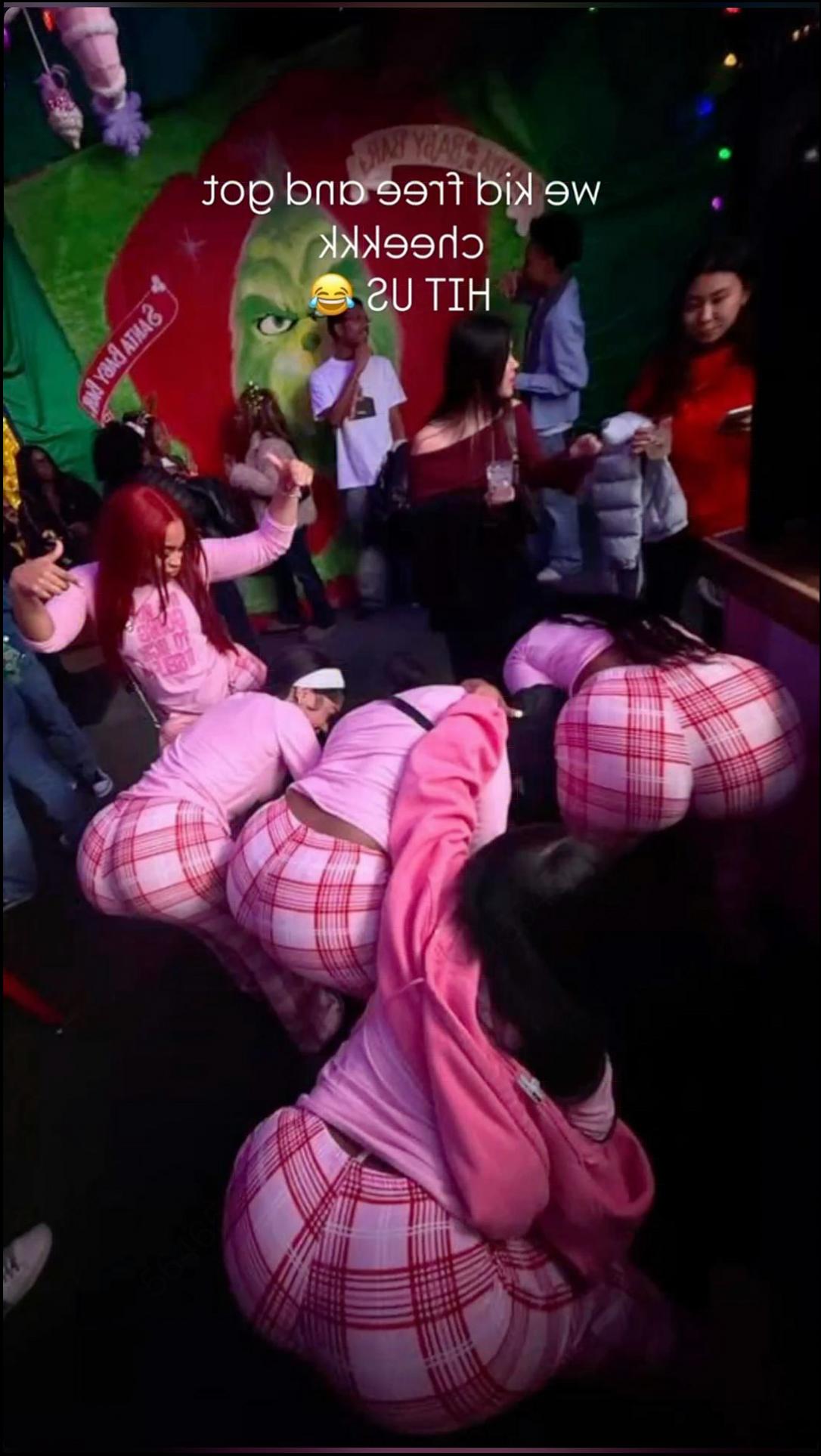 a woman is laying down on a bed with a stuffed animal