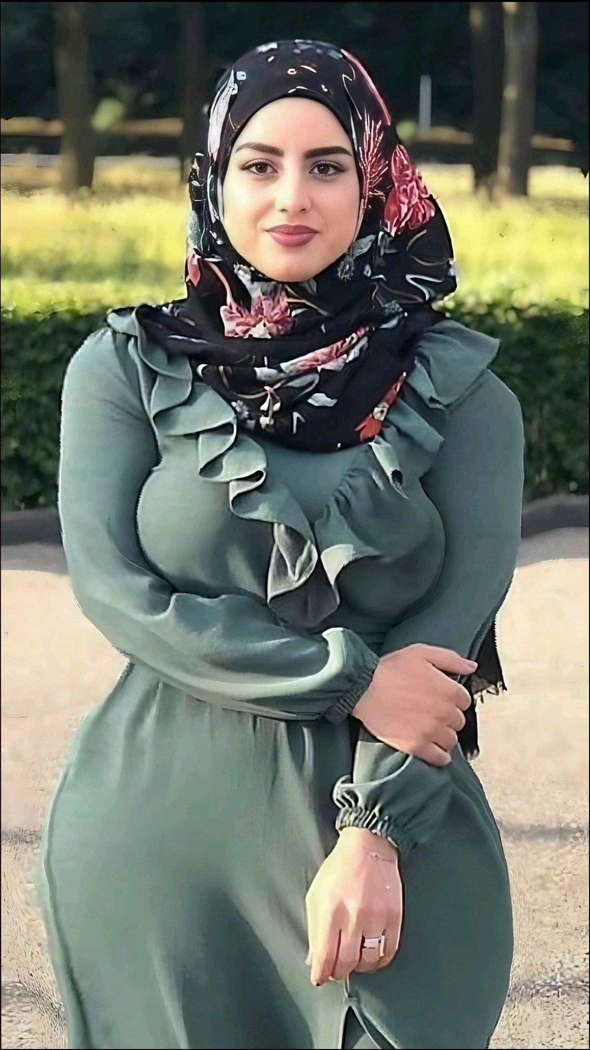 a woman dressed in a costume posing for a picture