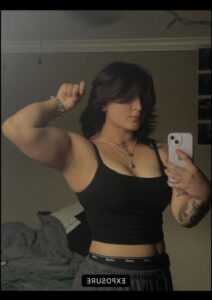 a woman holding a remote control in her hands