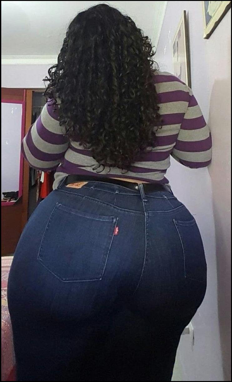 a woman is looking at her phone