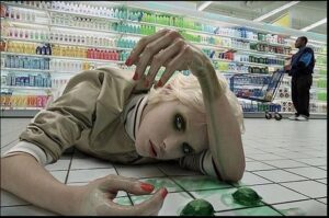 a person is laying down with a stuffed animal