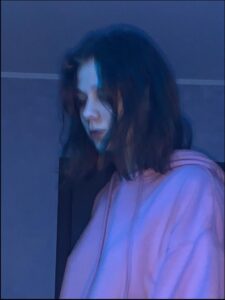 a woman with a red head mask and a red scarf