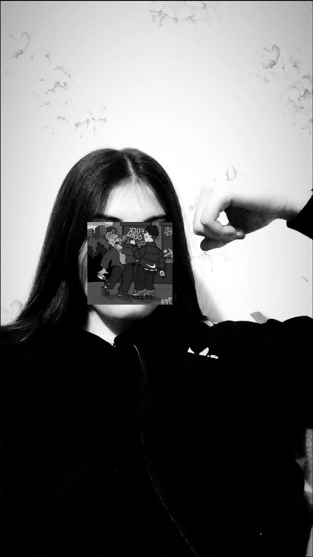 a woman holding a cell phone in her hand