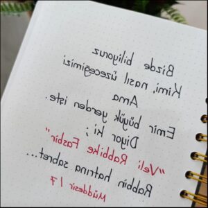 a white sign that is on a white board