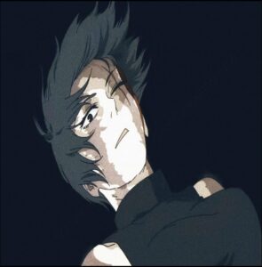 a man with a black beard and a black tie