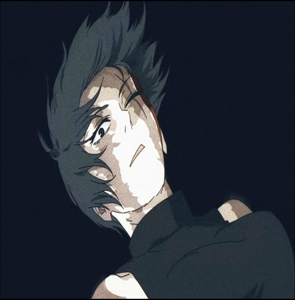 a man with a black beard and a black tie