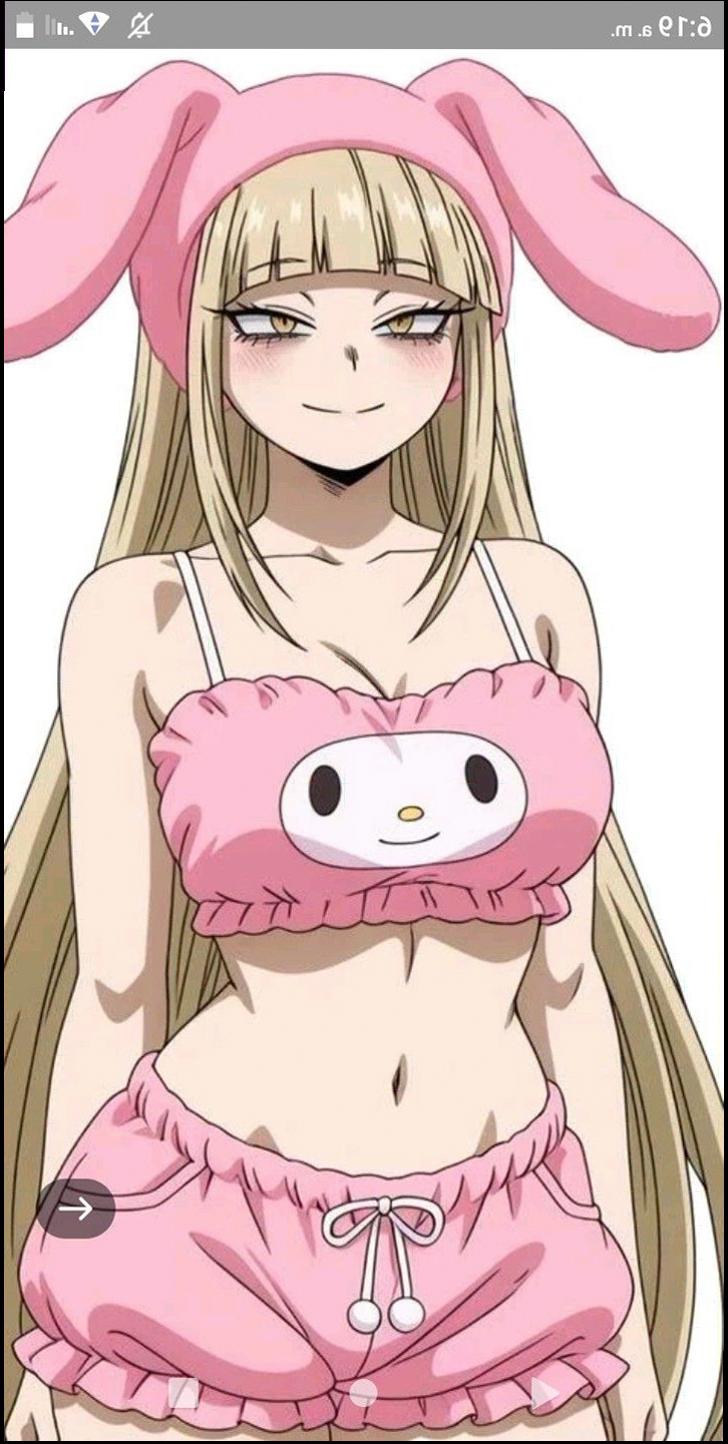 a doll with a pink bow on it