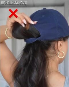 a woman wearing a blue hat and a blue cap