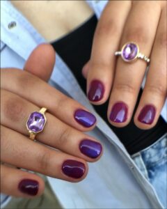 a person holding a pair of scissors