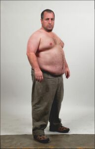 a man in a red shirt and a white shirt