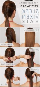 a woman is cutting a piece of paper with scissors