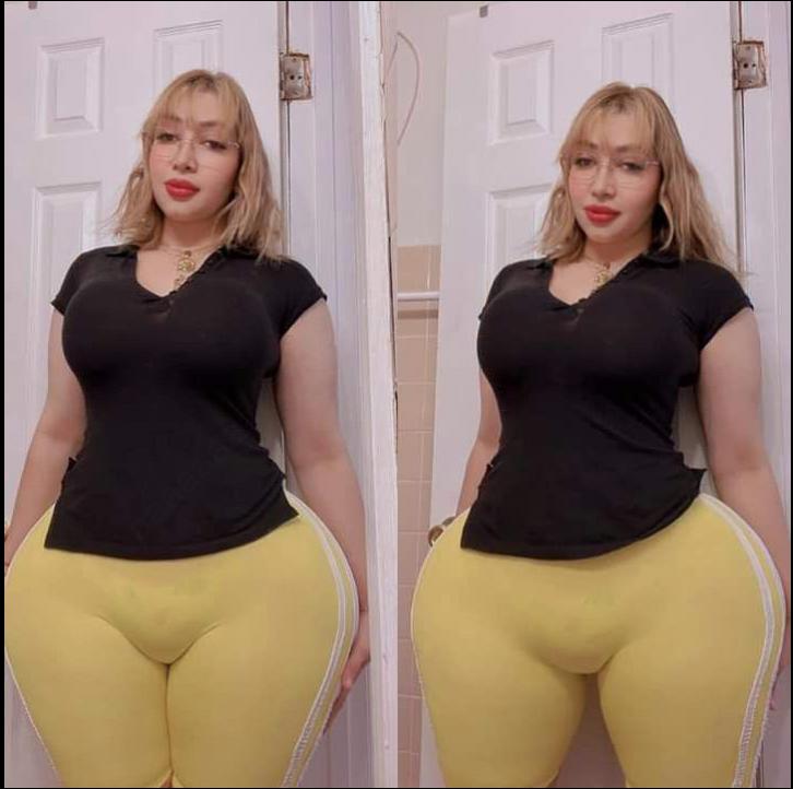 two women in a room with a wall mounted wall