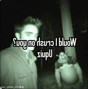 a man is holding a sign with a picture of a cat