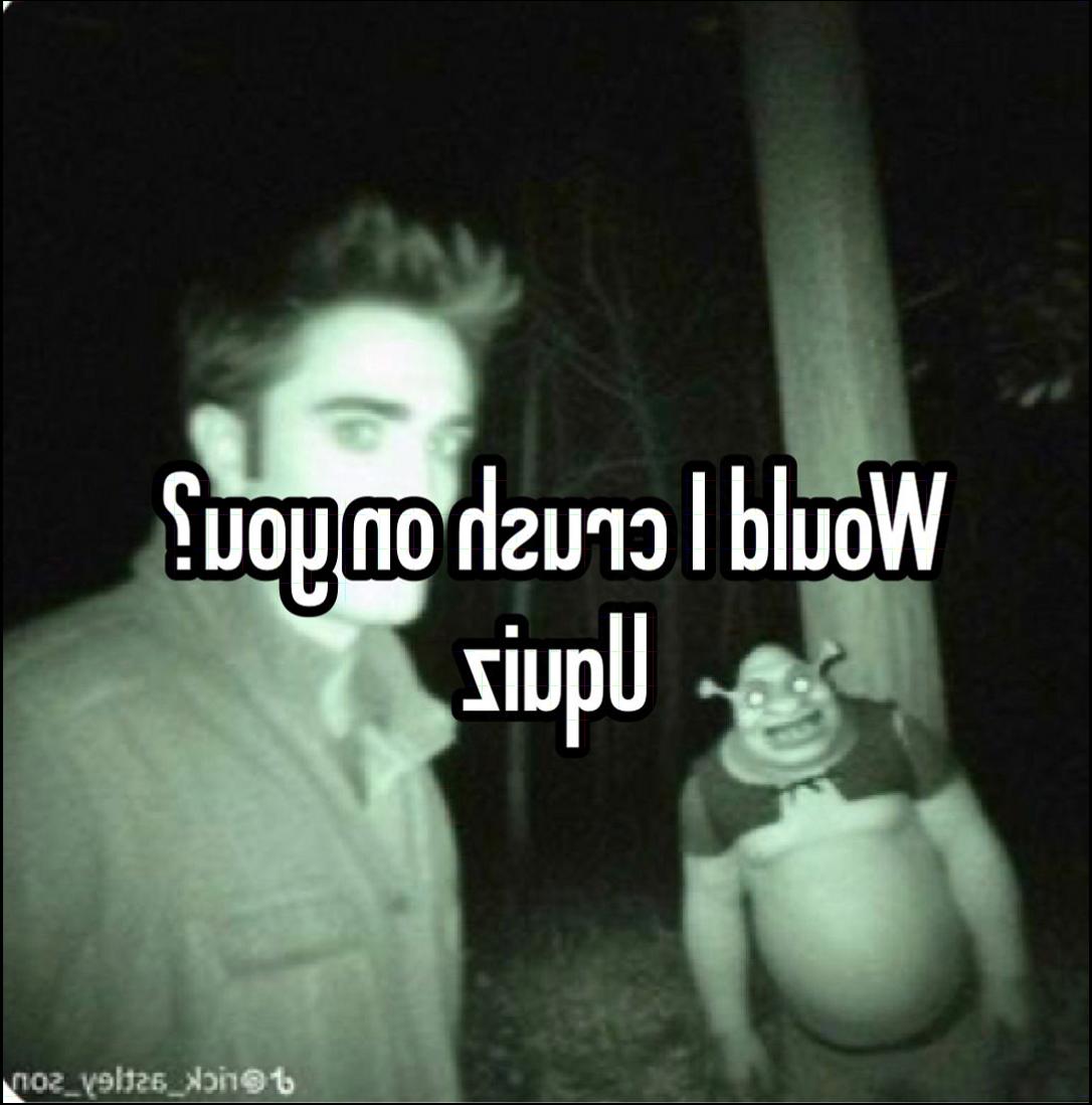 a man is holding a sign with a picture of a cat