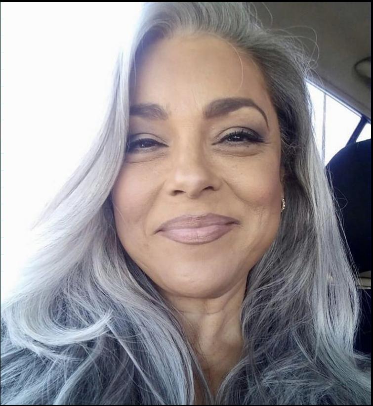 a woman with a black and white face