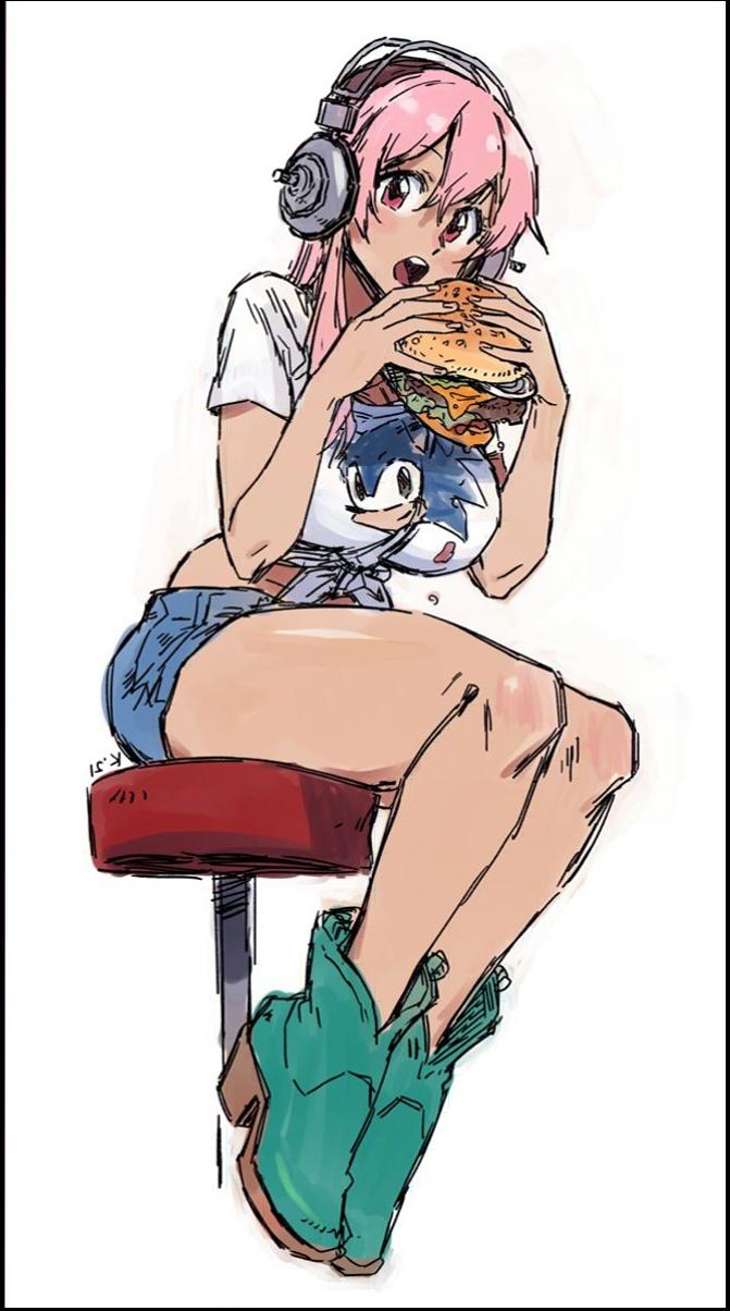 a woman is sitting on a red and white t-shirt