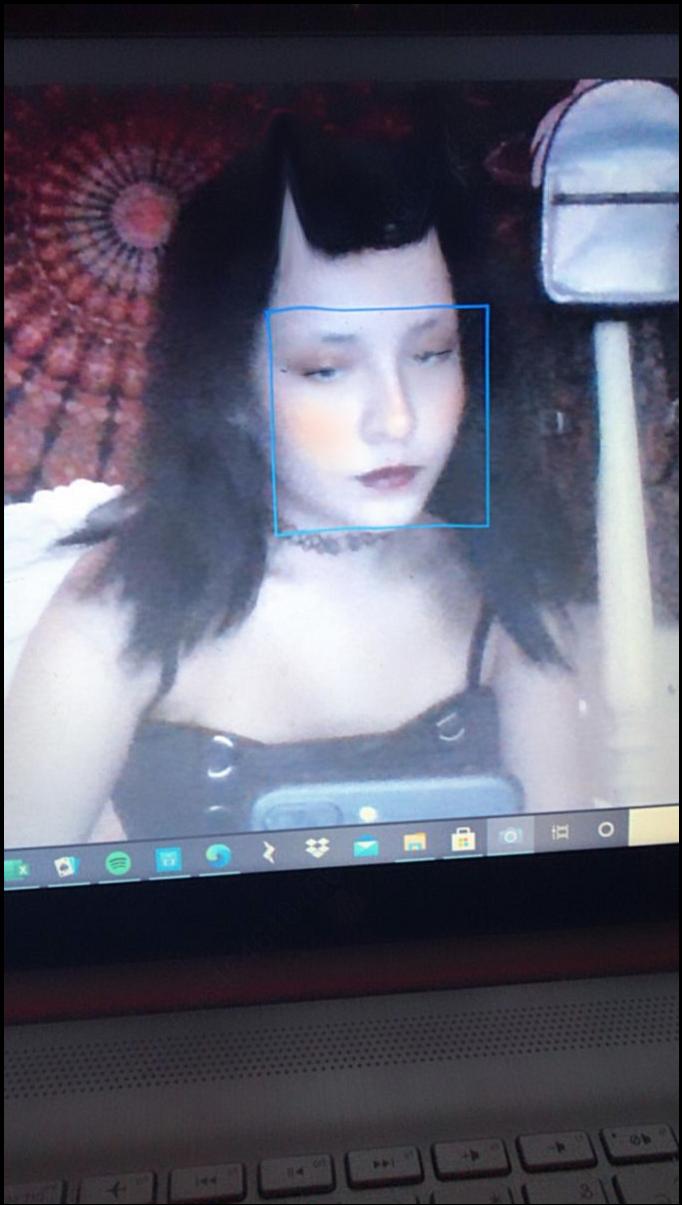 a woman with a cat on her lap