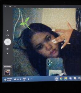 a woman is holding a computer screen and a cartoon