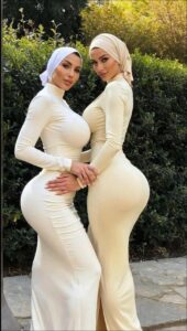 a woman and a man are posing for a picture