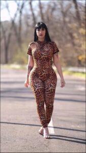 a woman in a black dress and a black skirt