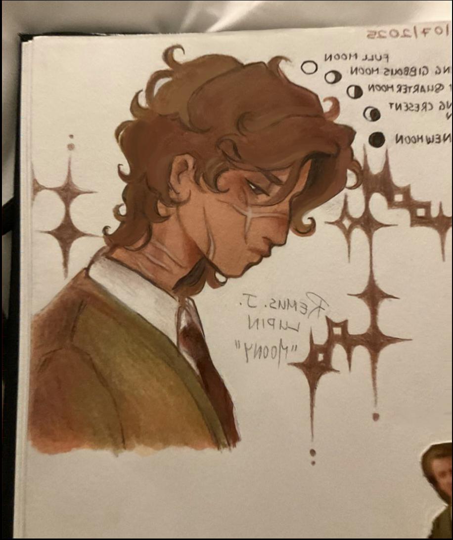 a man with a cartoon character on his head