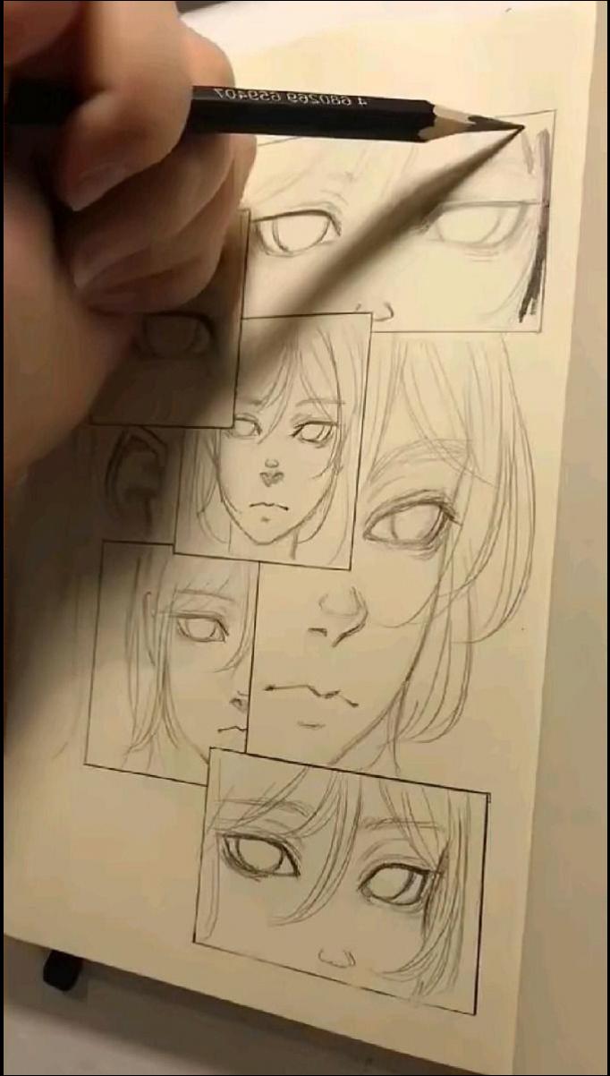 a person is painting a drawing on a paper