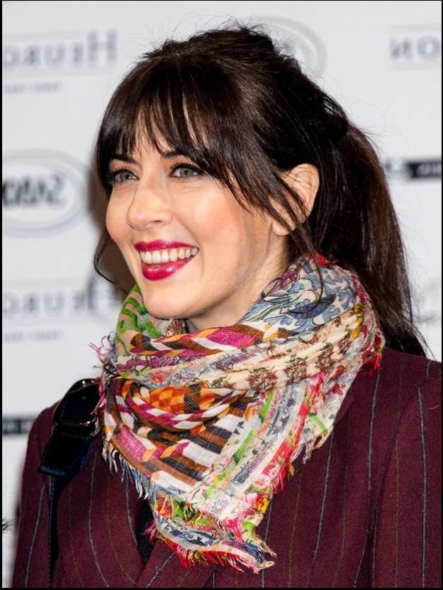 a woman wearing a red tie and a blue shirt