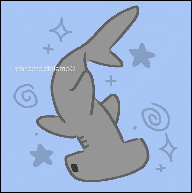 a stuffed animal with a bird on it