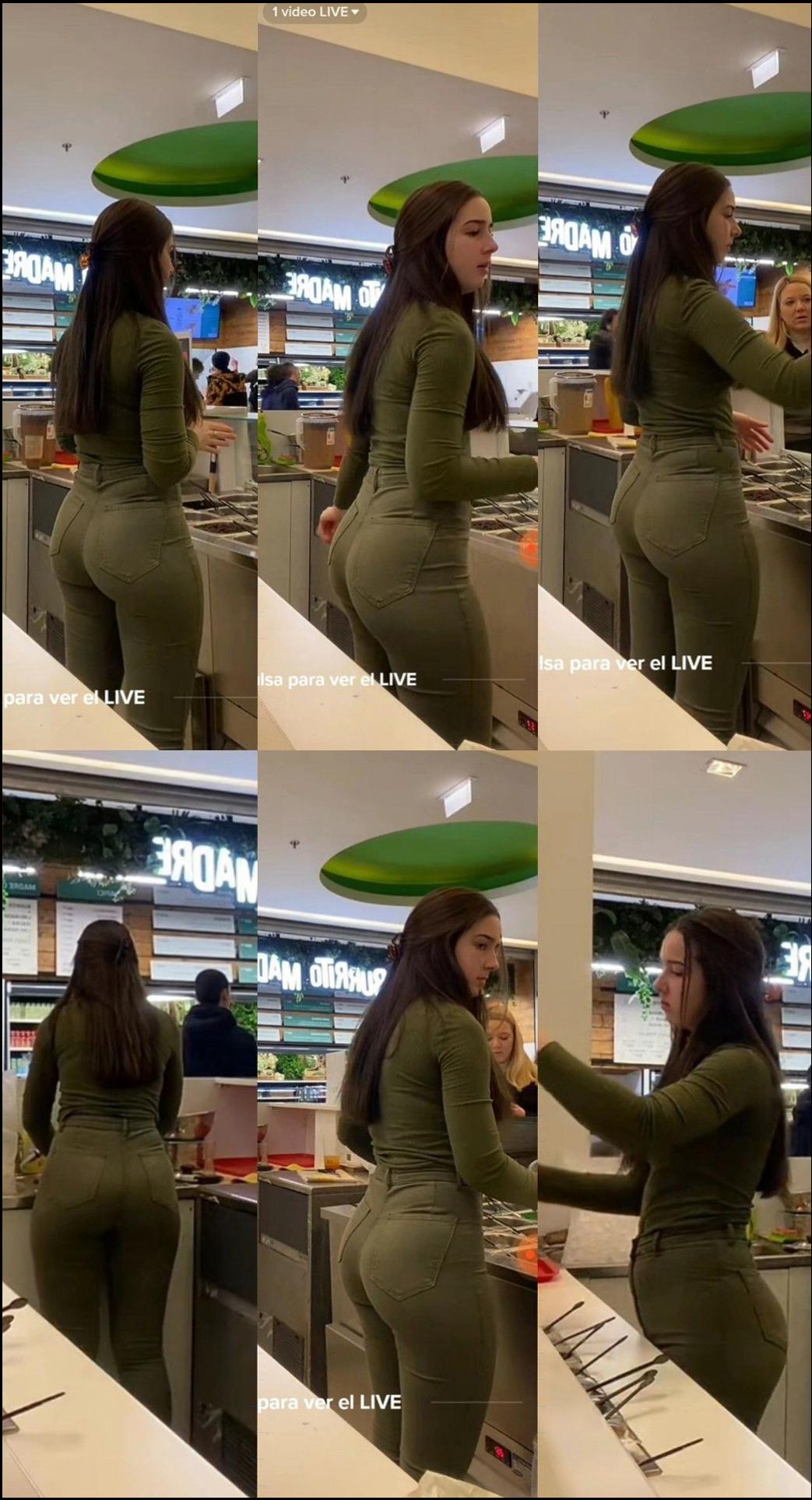 a woman is wearing a black and white striped shirt