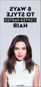 a woman with a funny face is posing for a picture