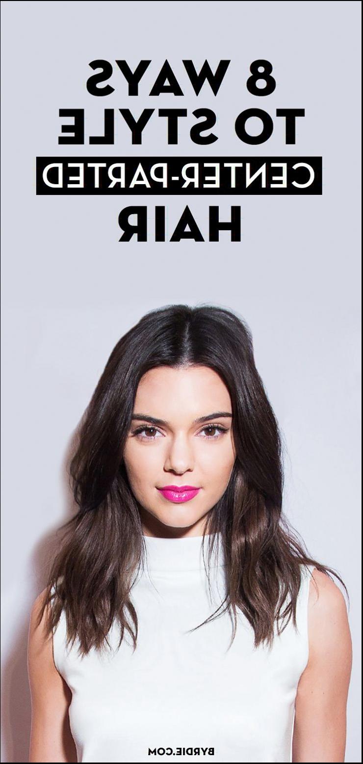 a woman with a funny face is posing for a picture