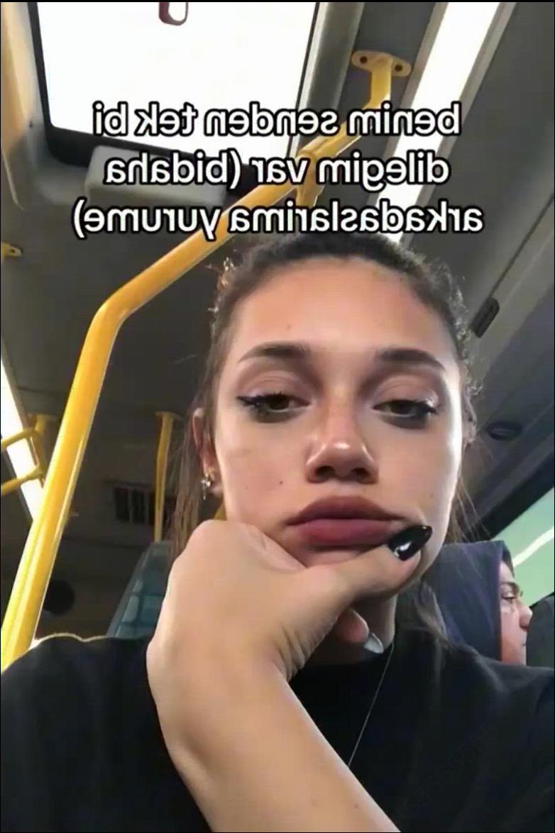 a woman is talking on a cell phone