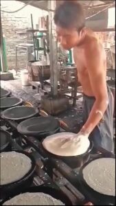 a man is making a bowl of food