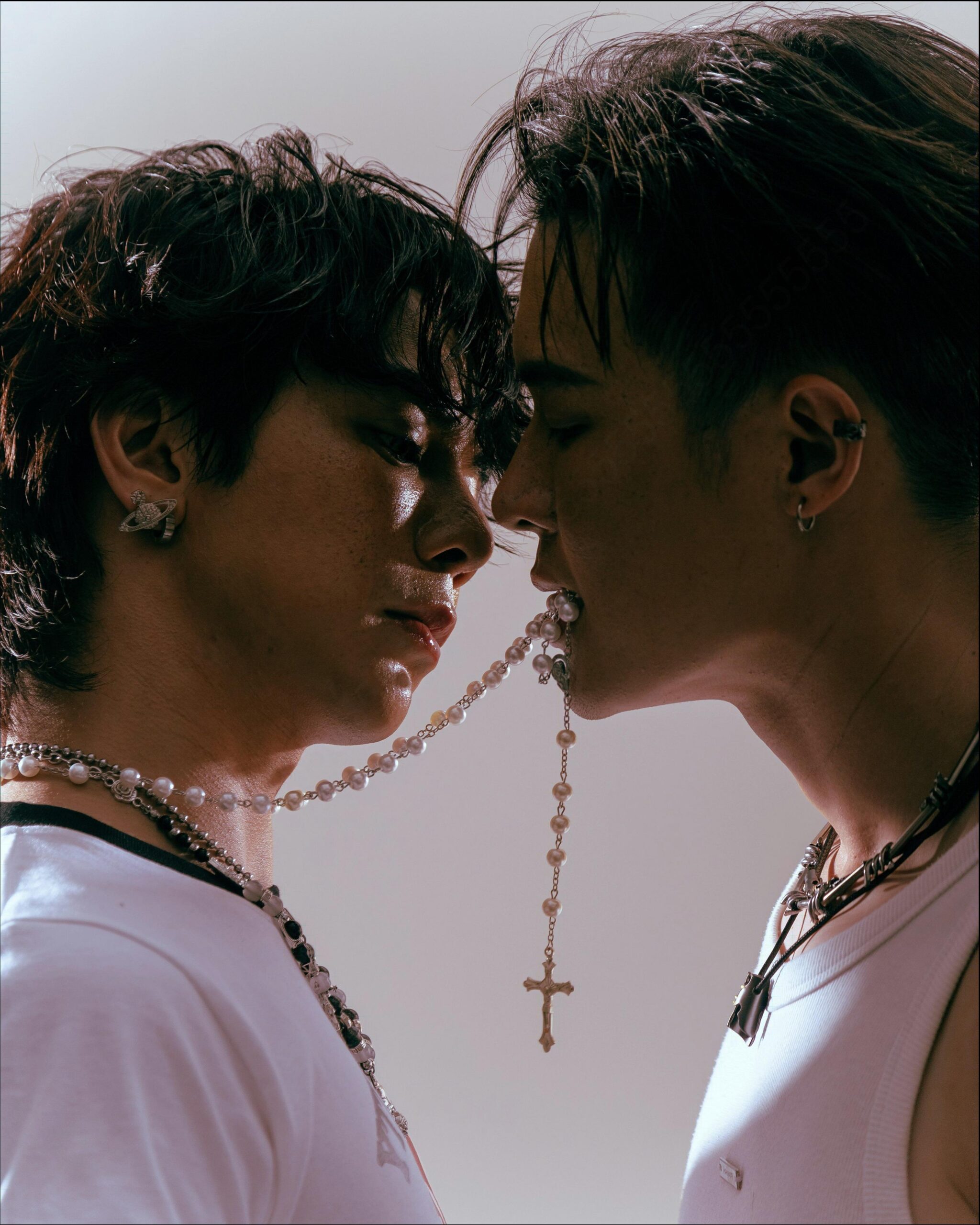 two people are standing in a field