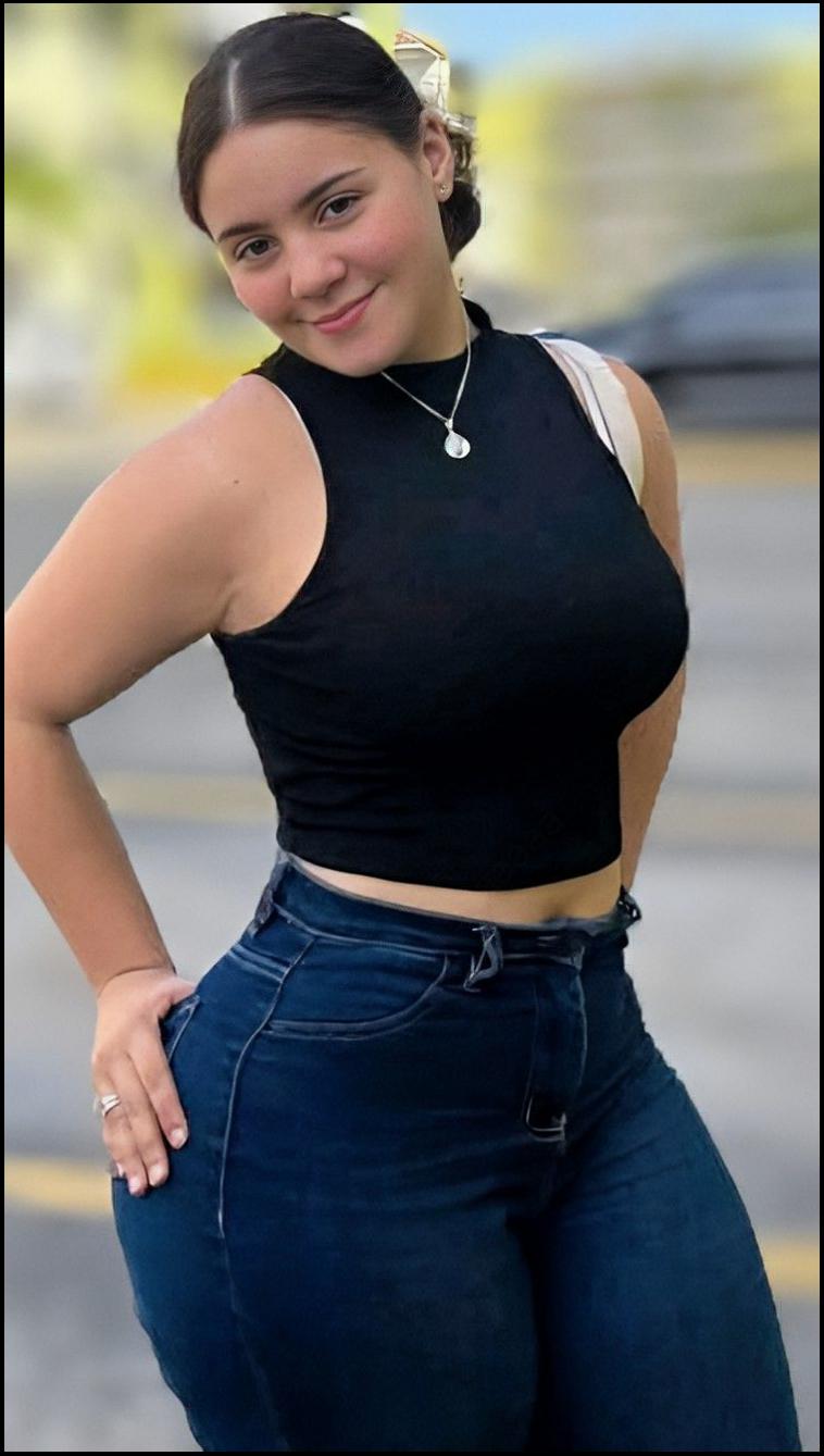 a woman wearing a black shirt and black pants