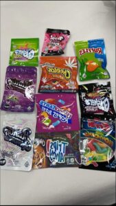 a pile of different colored and colored food