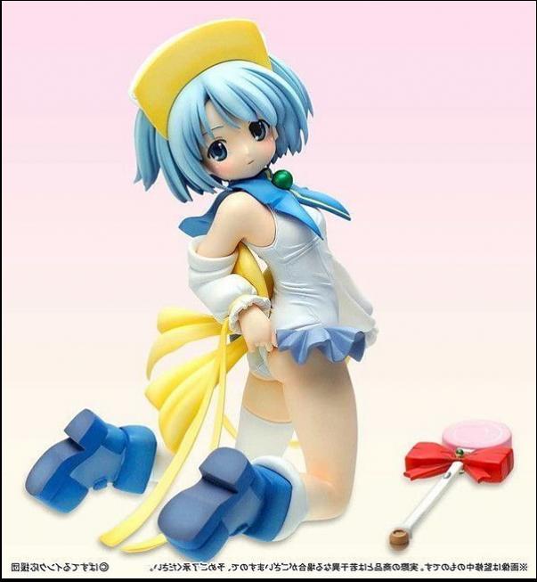 a doll with a hat and a banana on it