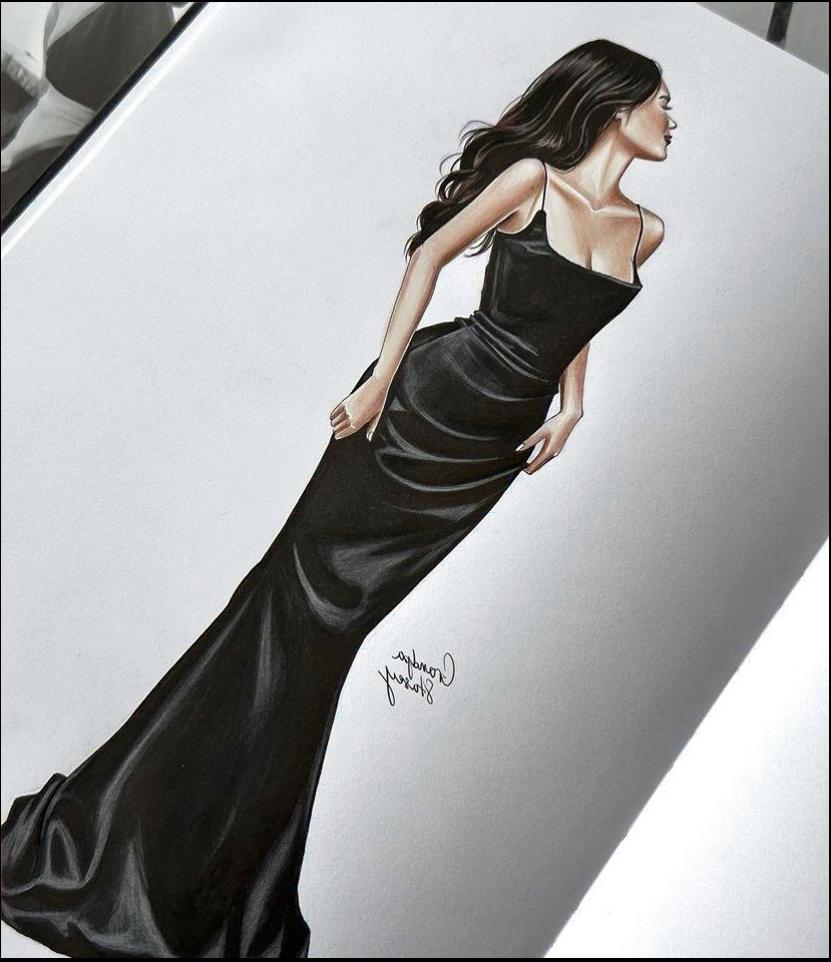 a woman in a black dress is standing in front of a wall