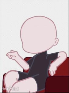 a woman is sitting on a red couch