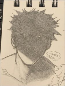 Man with spiky hair and earrings