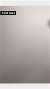 a street sign with a light on it