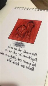 a red and white photo of a red and white sign