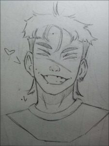 A pencil sketch depicts a male character with short, spiky hair, smiling broadly with his eyes closed. He wears a simple t-shirt and has a small earring in his right ear.