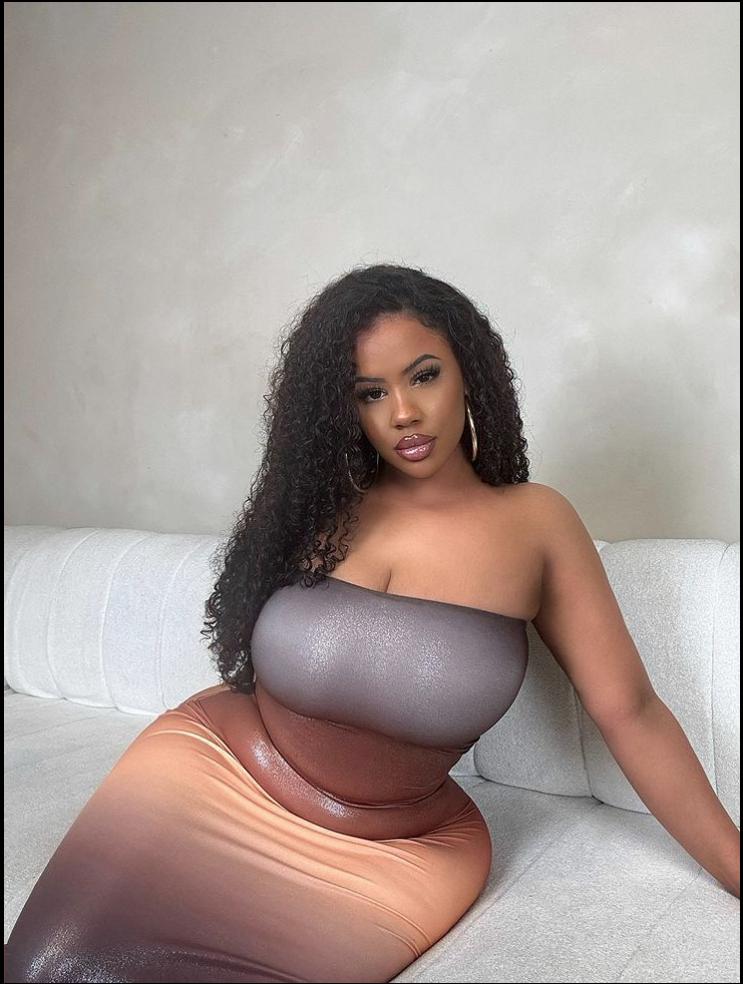 a woman in a white tank top and a black and white t-shirt