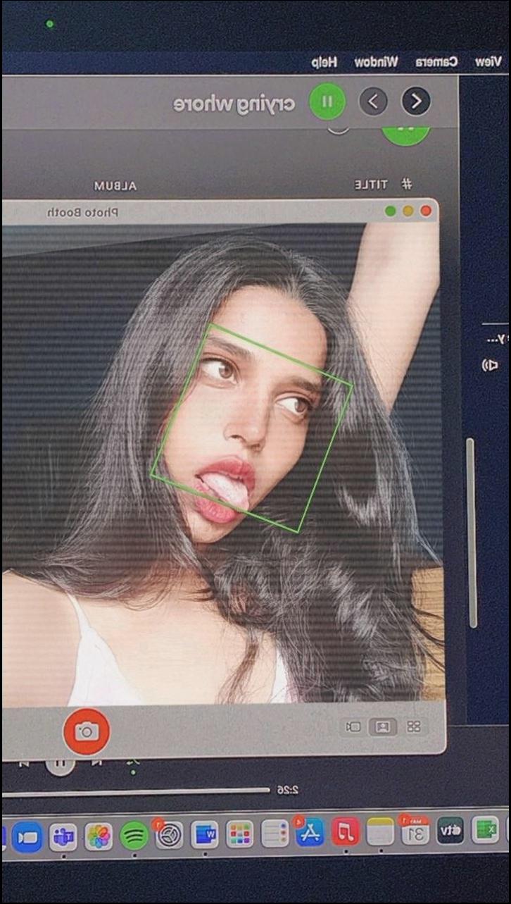 a woman with a funny face on a tv