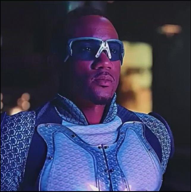 a man wearing a helmet and holding a camera