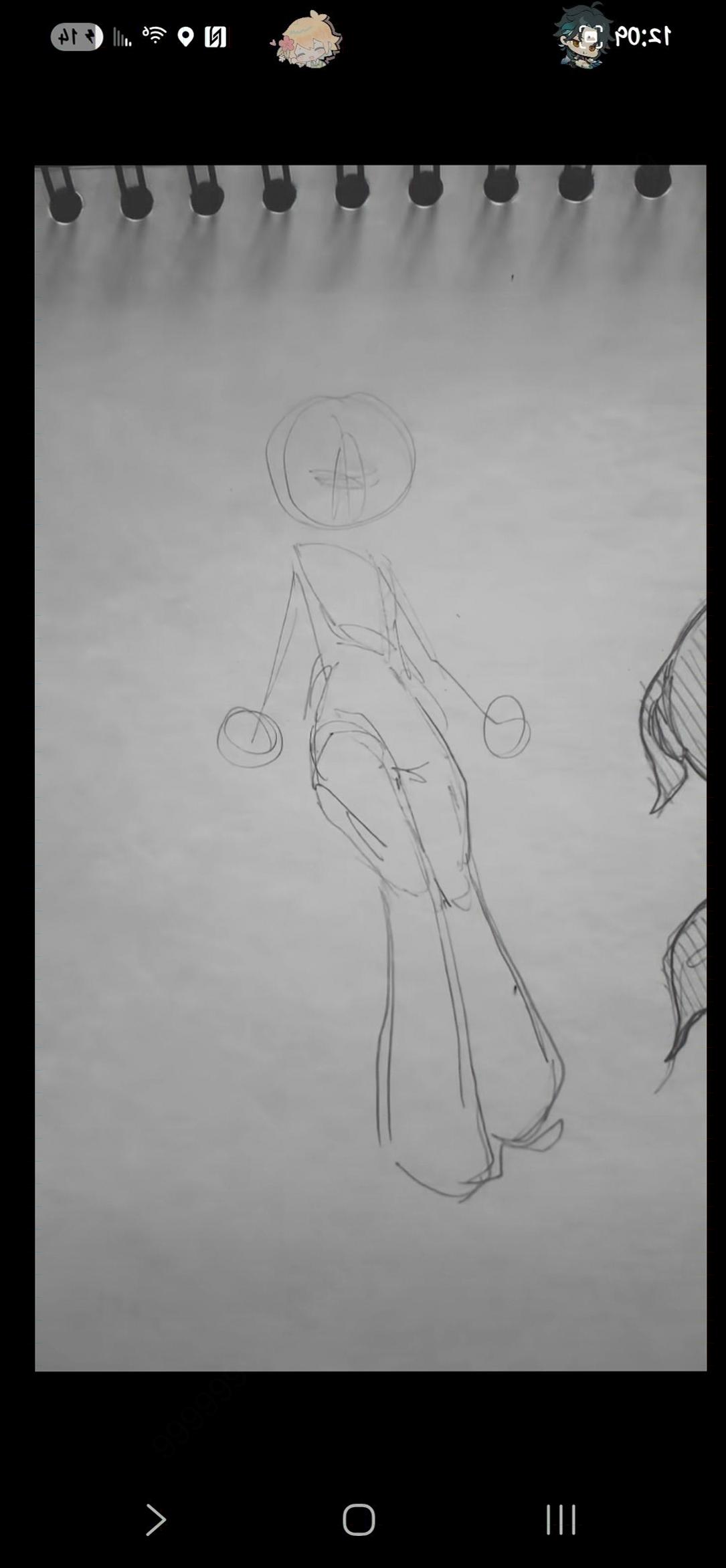 A black and white sketch depicts a stylized figure with wide-legged pants and a circular head. The figure holds circular objects in its hands and appears to be standing in a relaxed pose. The sketch is drawn on a sketchbook page with spiral binding.