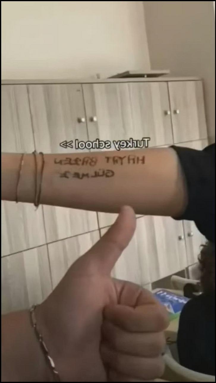 a person holding a knife in a room